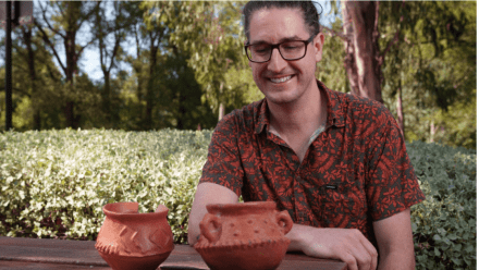 Mathieu Leclerc observes pots manufactured in Wusi, on the West Coast of Espiritu Santo Island in Vanuatu, where traditional pottery-making is still practiced today. Photo: Dave Fanner
